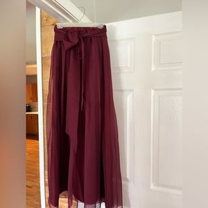 Handmade skirt with waist tie. Worn on the higher waist.